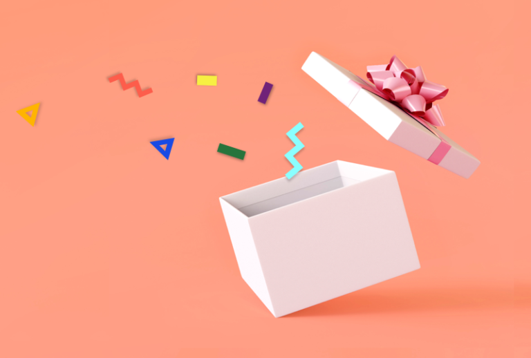 Present box with confetti on coral background